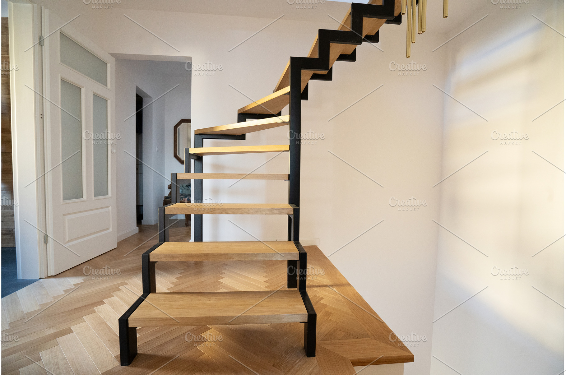 Metal staircase in modern home, an Architecture Photo by Neirfy