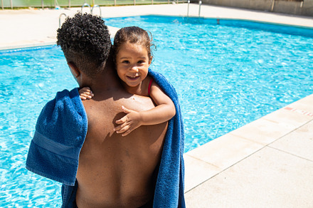 Cute kid hugging anonymous father, a Holiday Photo by Benii_photography