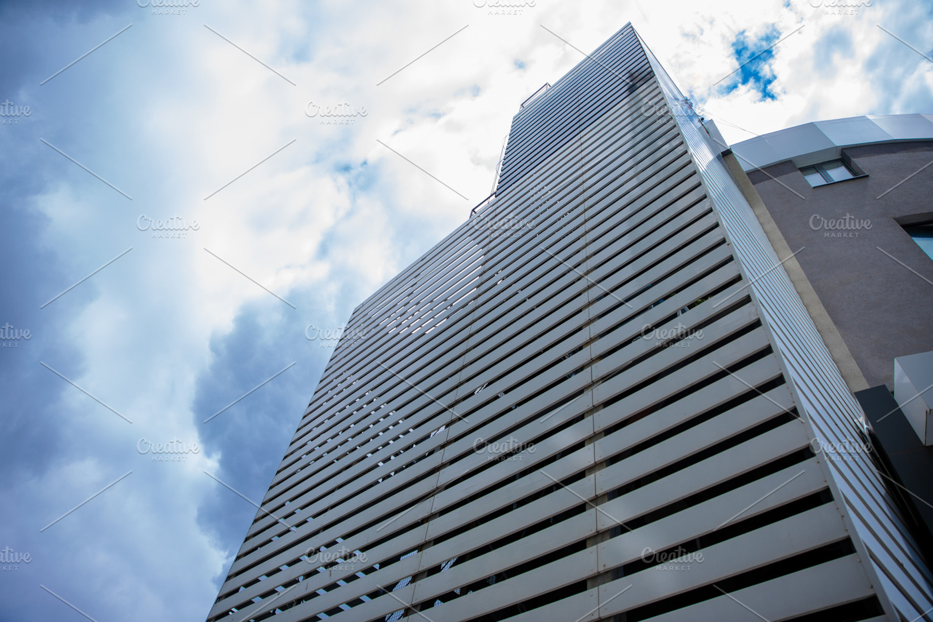 Low-angle view of a contemporary high-rise building with horizon, a Nature Photo by Ales Munt