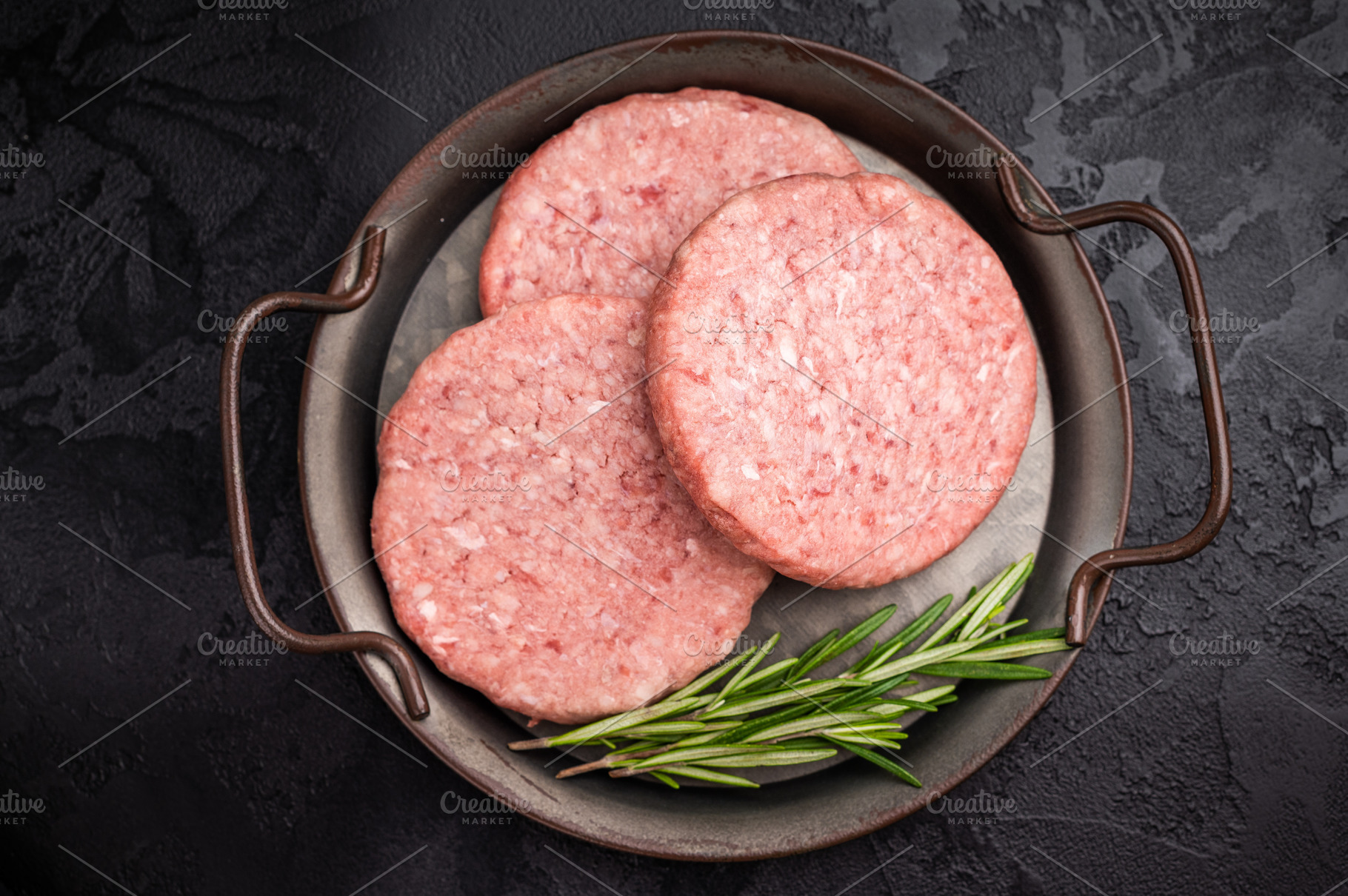 Freshly formed raw meat patty with herbs for burgers, perfect fo, a Food & Drink Photo by composter-box@mail.ru