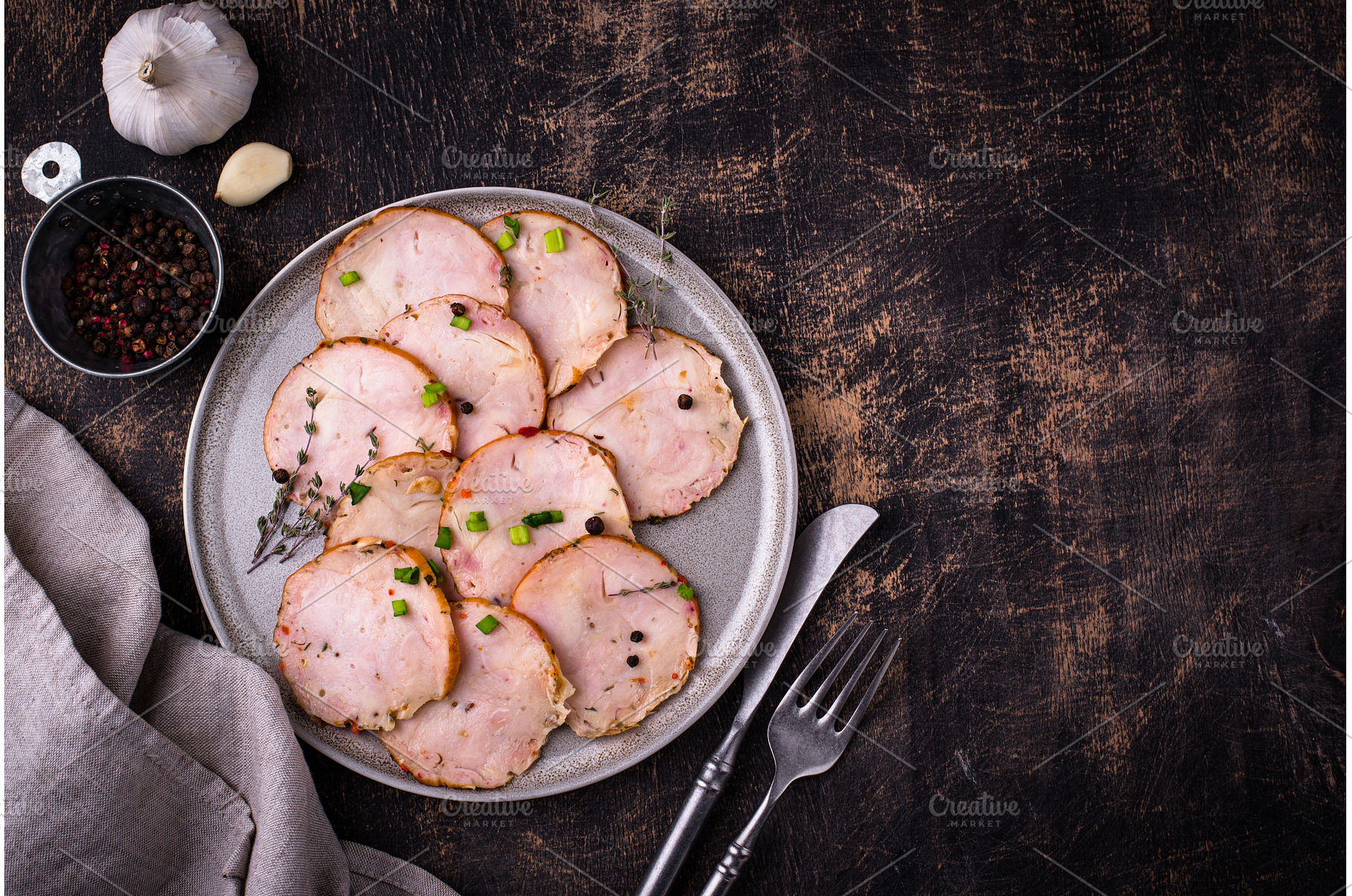 Sliced chicken sausage with herbs, a Food & Drink Photo by Yulia Furman
