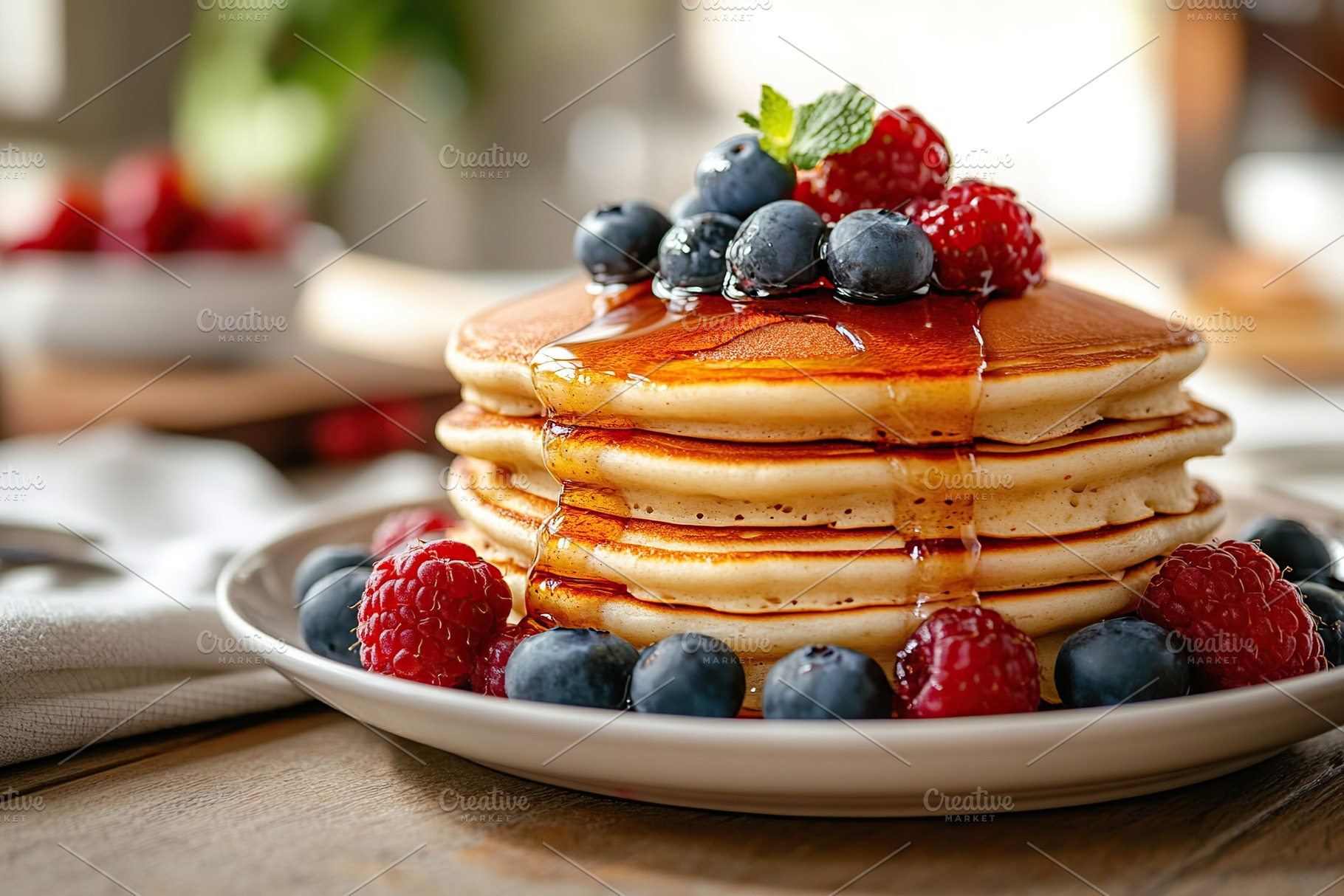 Delicious pancakes stacked high with sweet syrup and fresh berries in a cozy br, a Food & Drink Photo by AlyaAnd