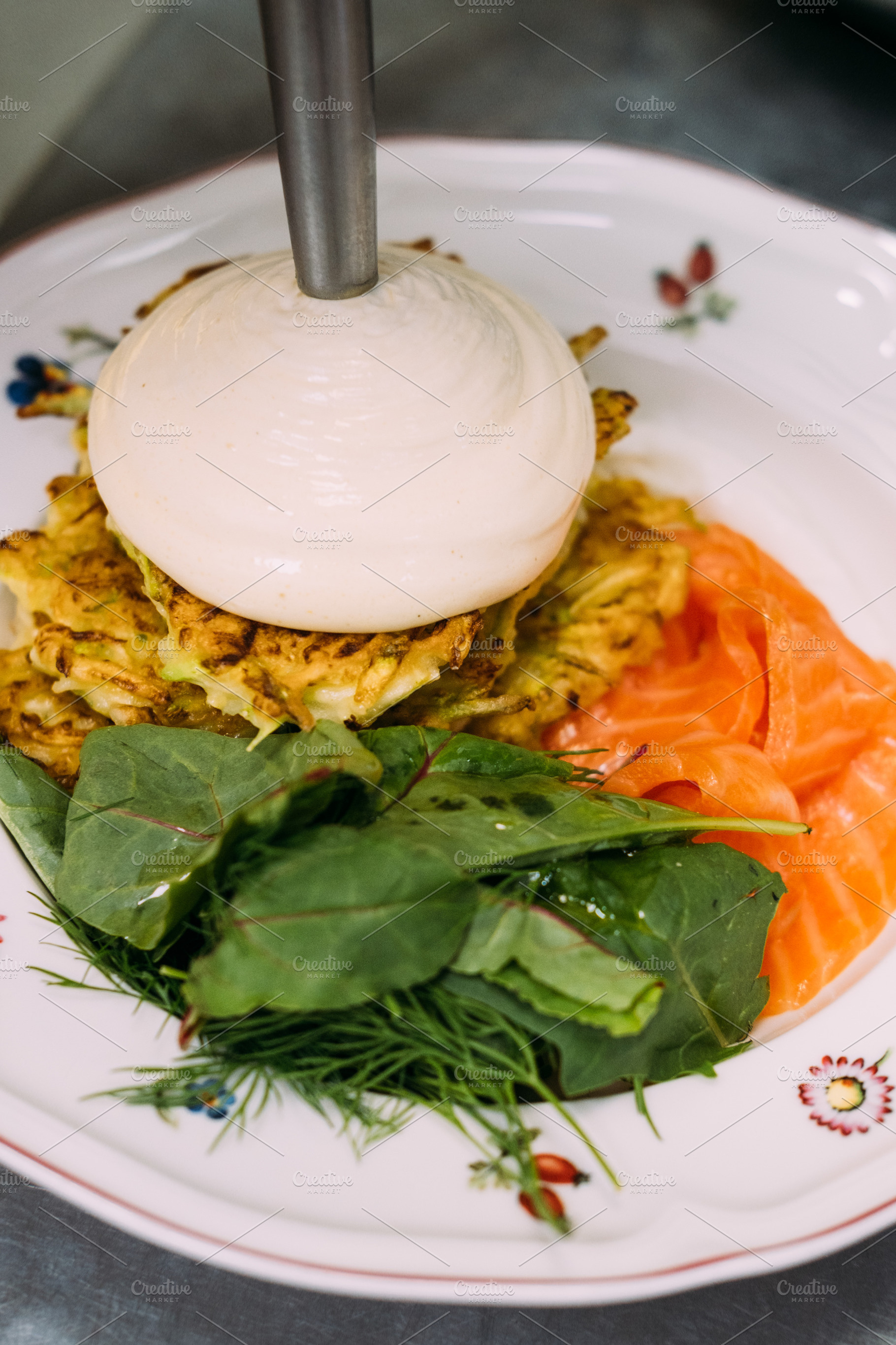 Preparing dish gourmet food cream siphon sauce, a Food & Drink Photo by Photo Drive Studio