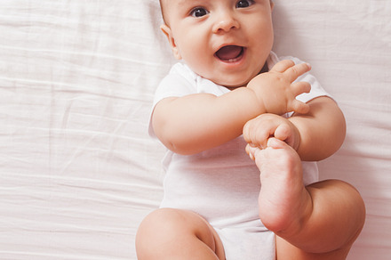 Portrait of a baby lying on the bed containing adorable, affectionate, and, a Person Photo by oksix