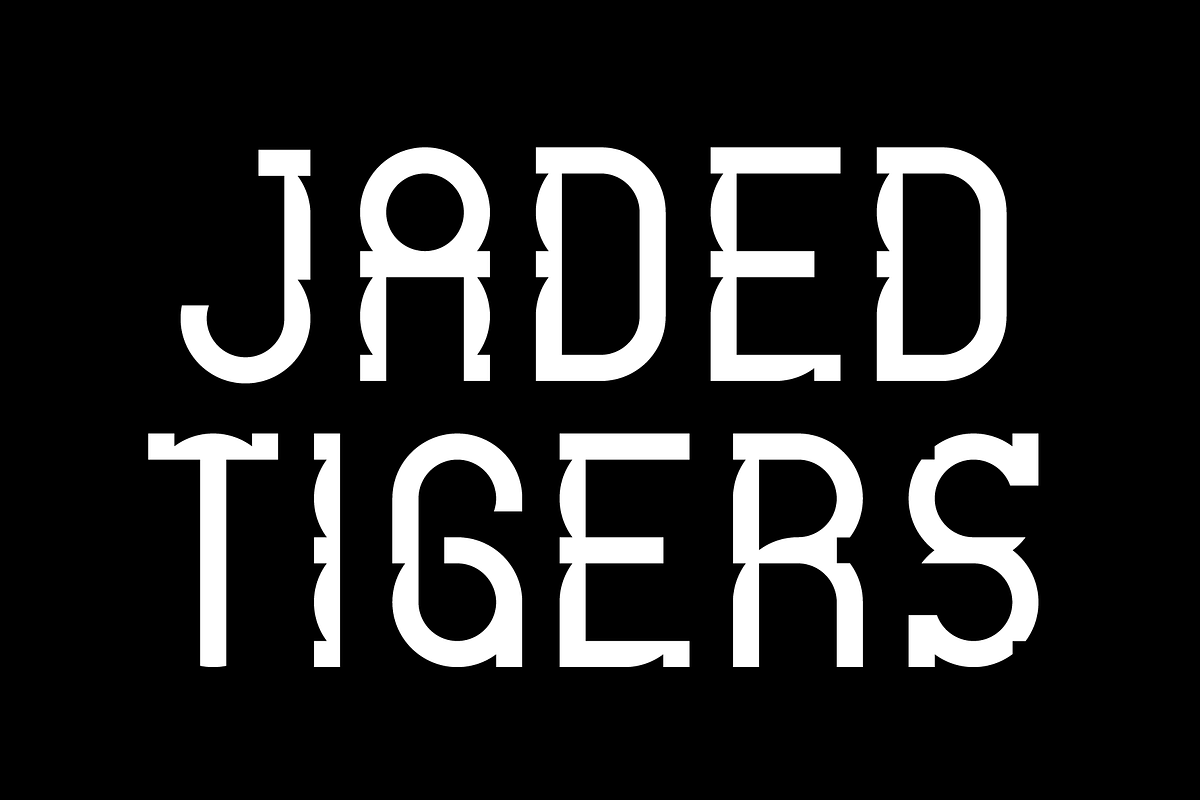 Jaded Tigers - Display Typeface, a Font by Press & Pen (Photo 1 of 9)