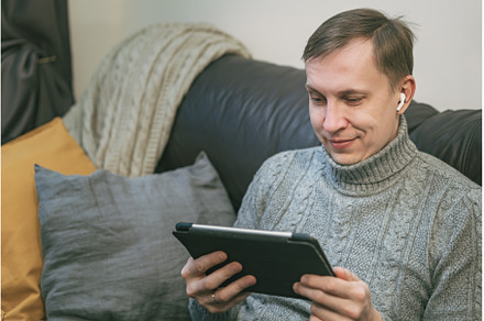man using a digital tablet, a Holiday Photo by piter.goskov