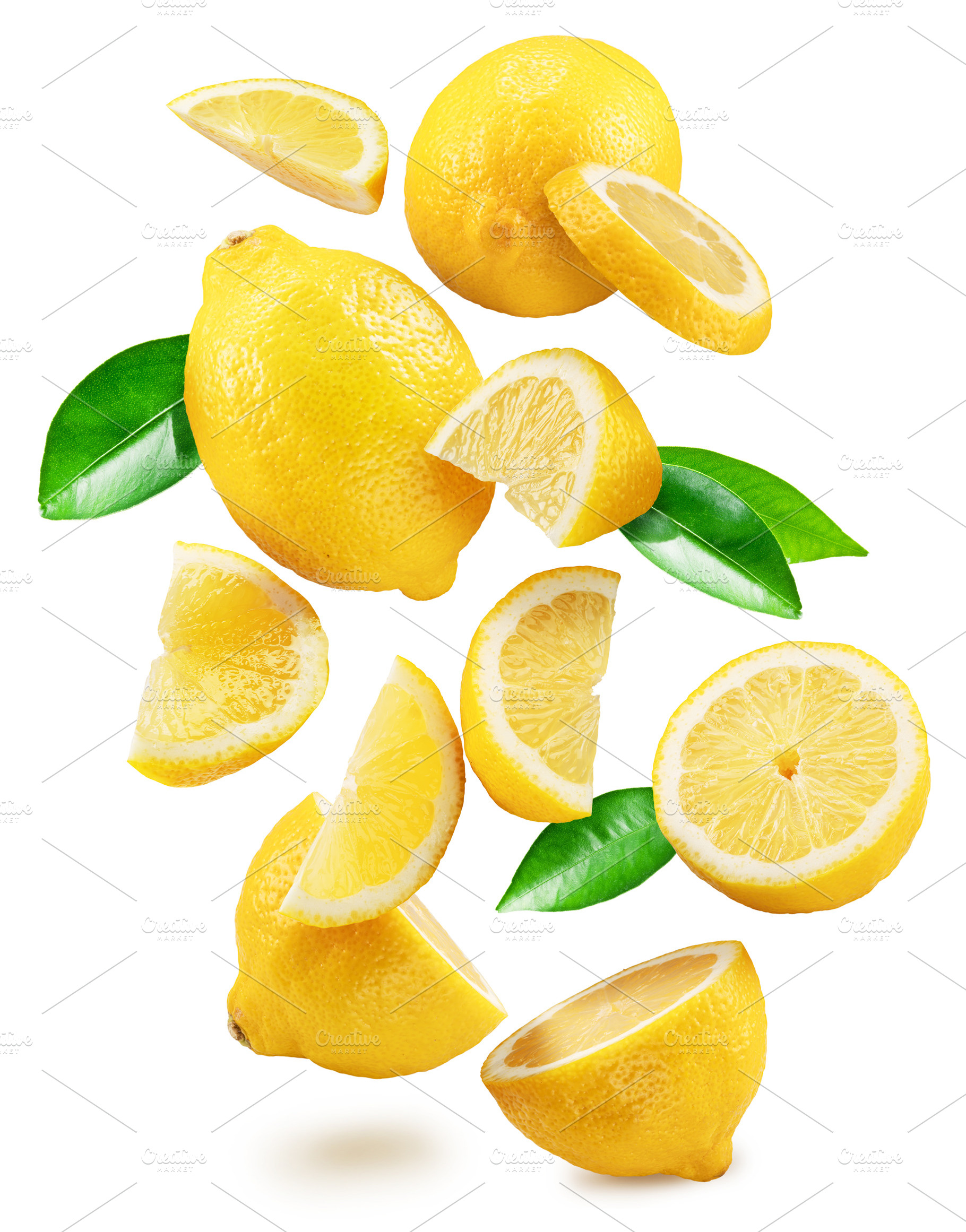 Ripe lemon fruits, slices and leaves flying in air white backgro, a Food & Drink Photo by Volff