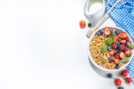 Healthy breakfast granola with berry, a Food & Drink Photo by Rimma