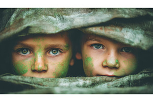 Children disguised in camouflage, a Person Photo by ZinetroN