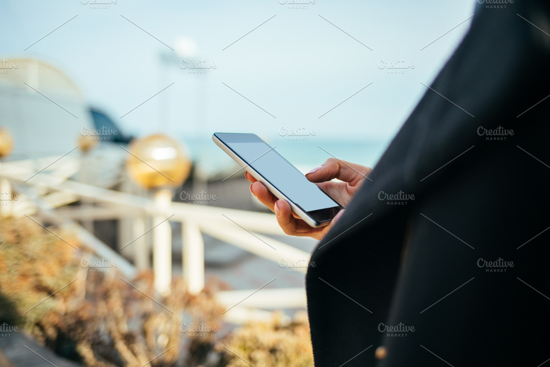Mobile phone in hand of young woman, a Technology Photo by progressman