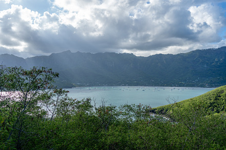 Taiohae Bay and town with anchored sailboats in Nuku Hiva, Marqu