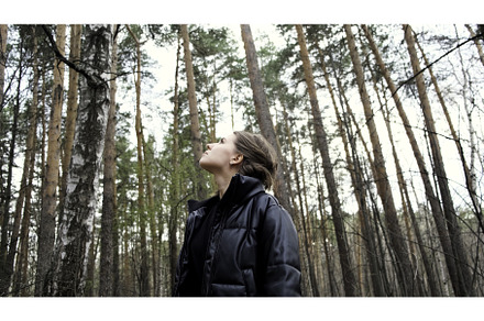 Beautiful woman hiking in the forest, a Nature Photo by Media Whale Stock