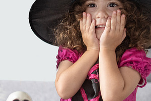 Little Girl in Witch Costume Surprised by Halloween Cake, a Food & Drink Photo by etorres69