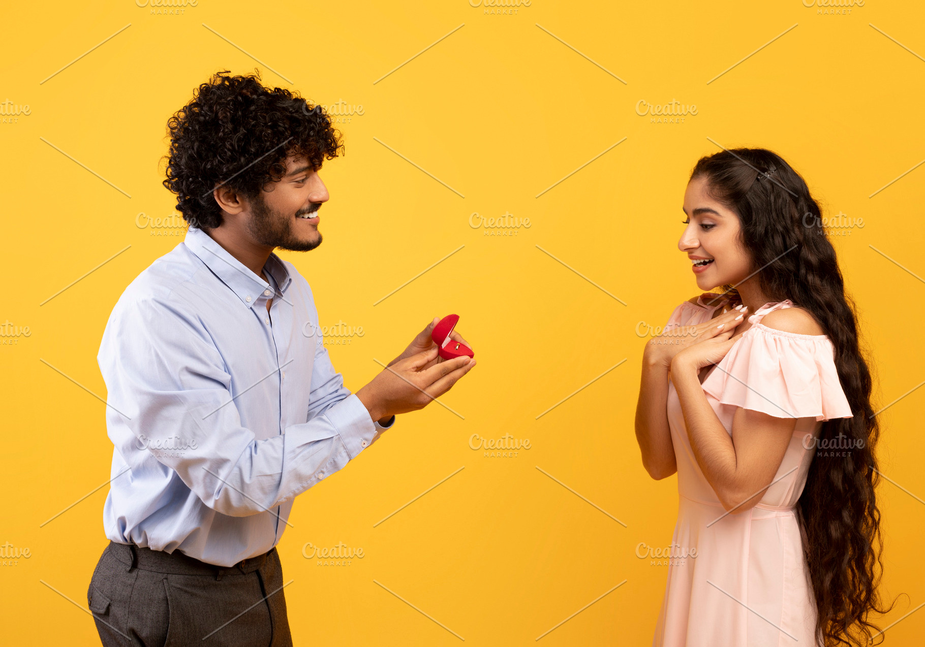 Marry me concept. Happy indian man proposing showing engagement ring box and as, a Photo by Prostock-Studio