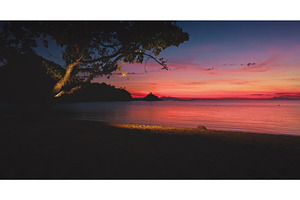 Tropical beach sunset illuminating, a Nature Photo by Goinyk