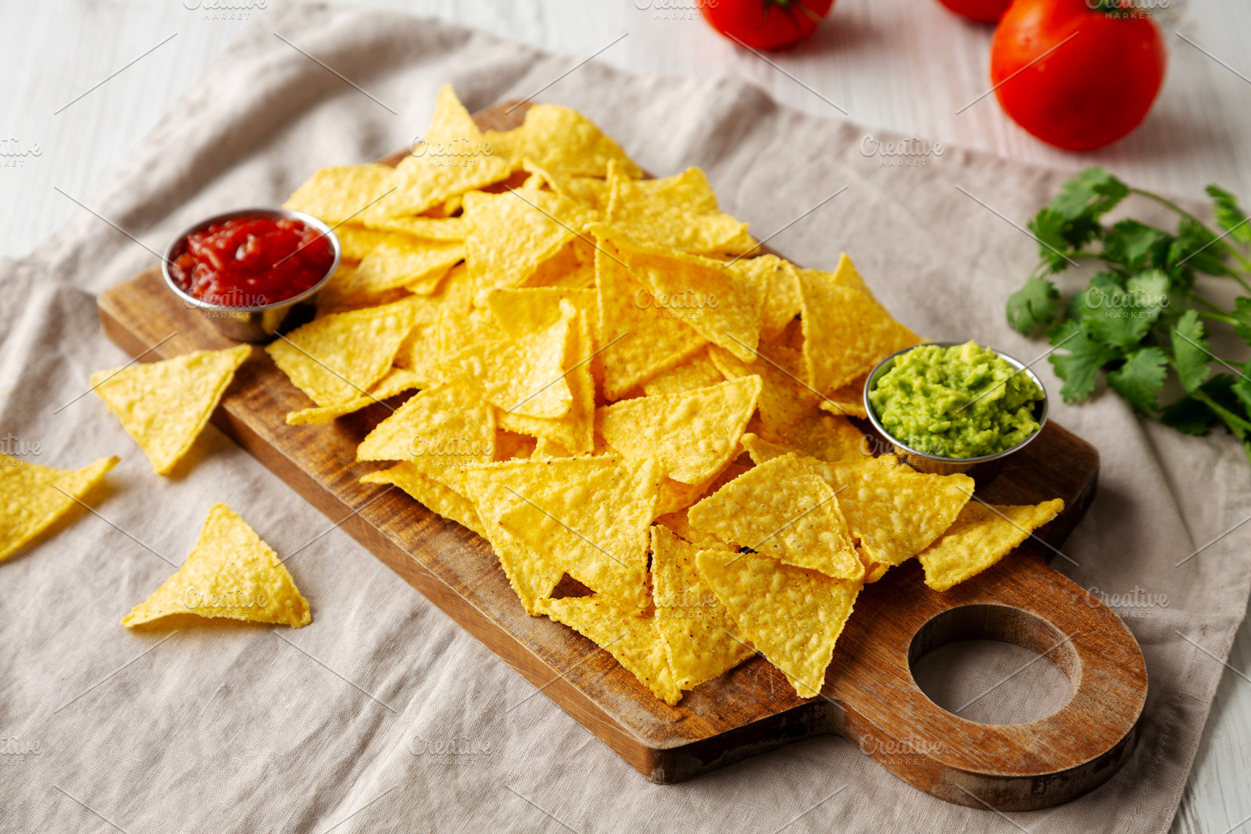 Homemade Corn Tortilla Chips with Tomato Salsa and Guacamole, a Food & Drink Photo by LiudmylaChuhunova