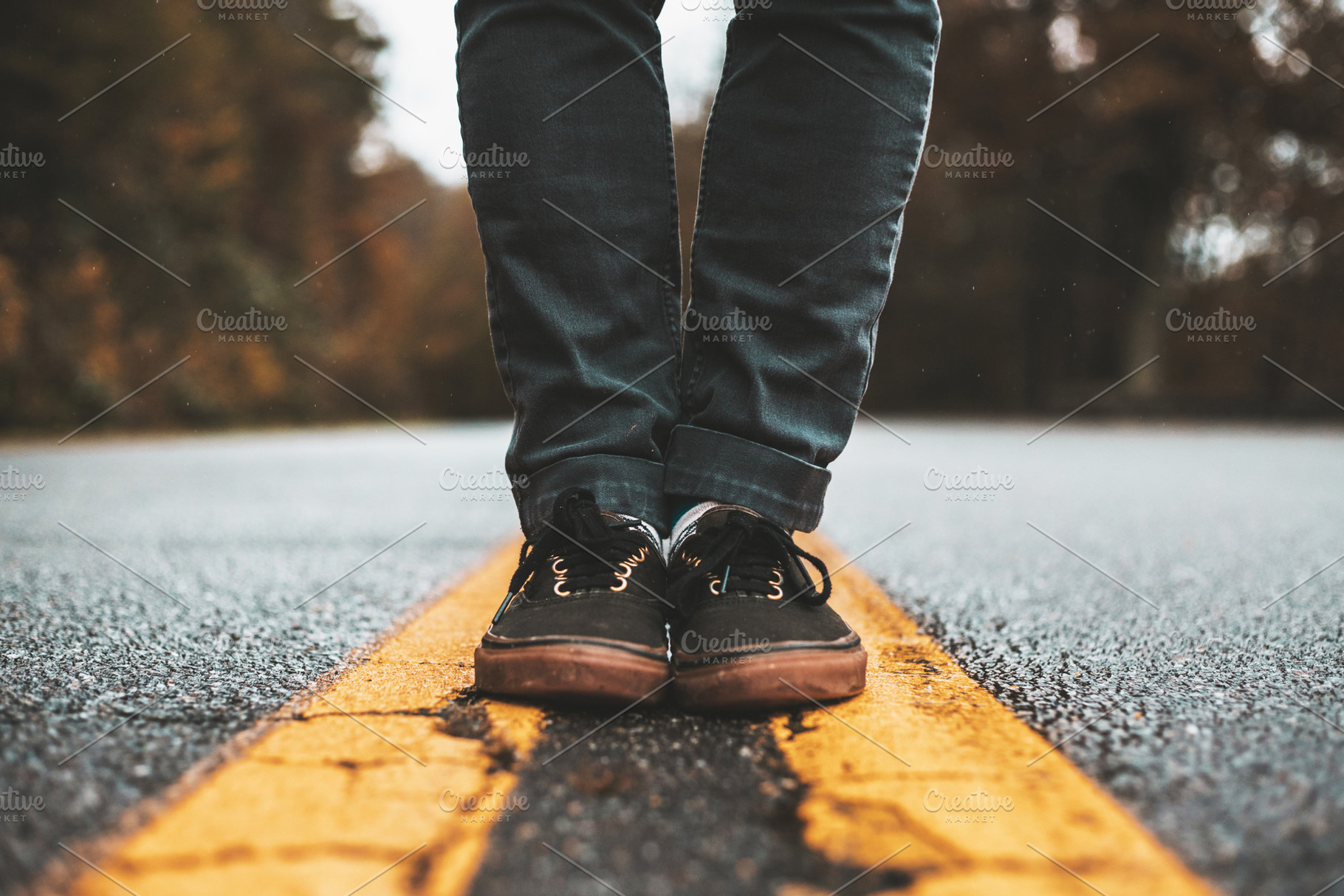 Up on the mountain containing vans, shoes, and sneakers, a Person Photo by AlyssaKayeGraham