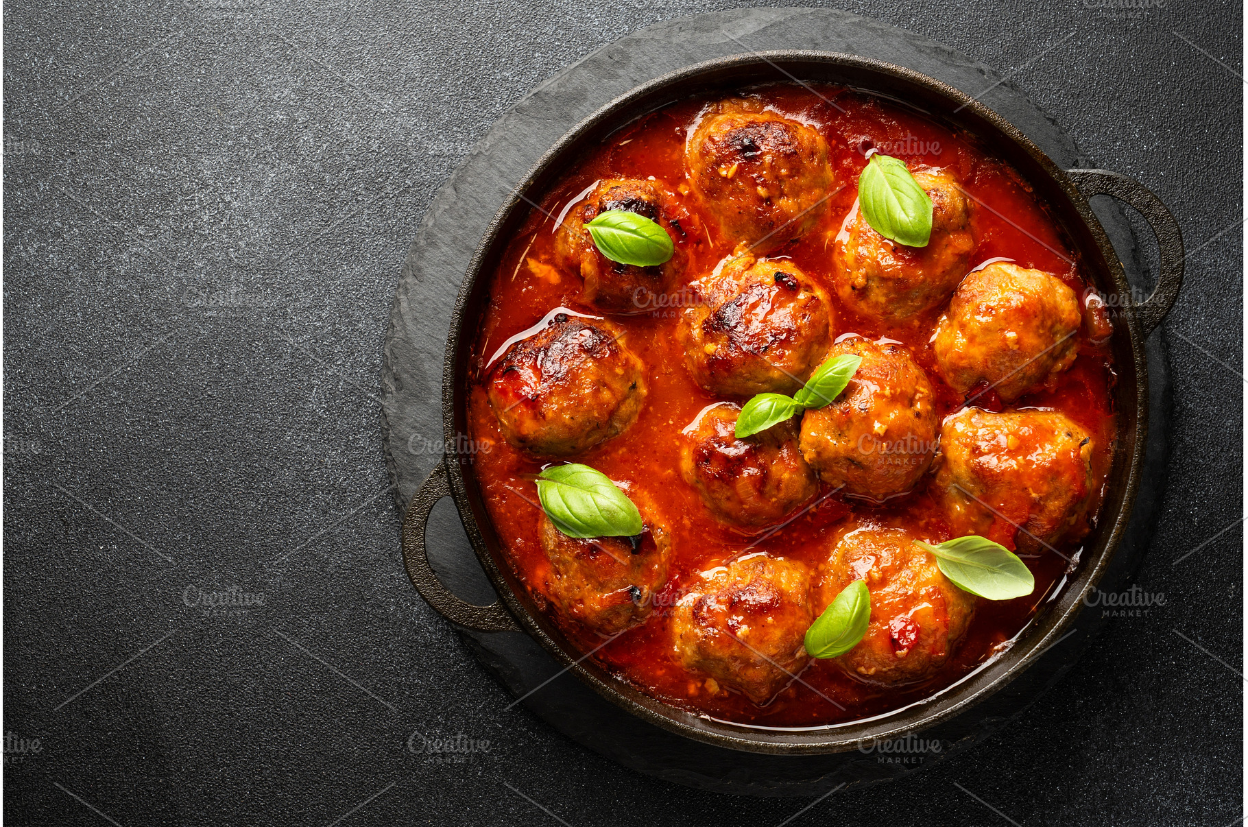 Meatballs in tomato sauce in iron, a Food & Drink Photo by Nadia-nb