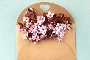 Spring Blossoms in Kraft Envelope with Heart Cutout, a Holiday Photo by Natalia Klenova's Shop