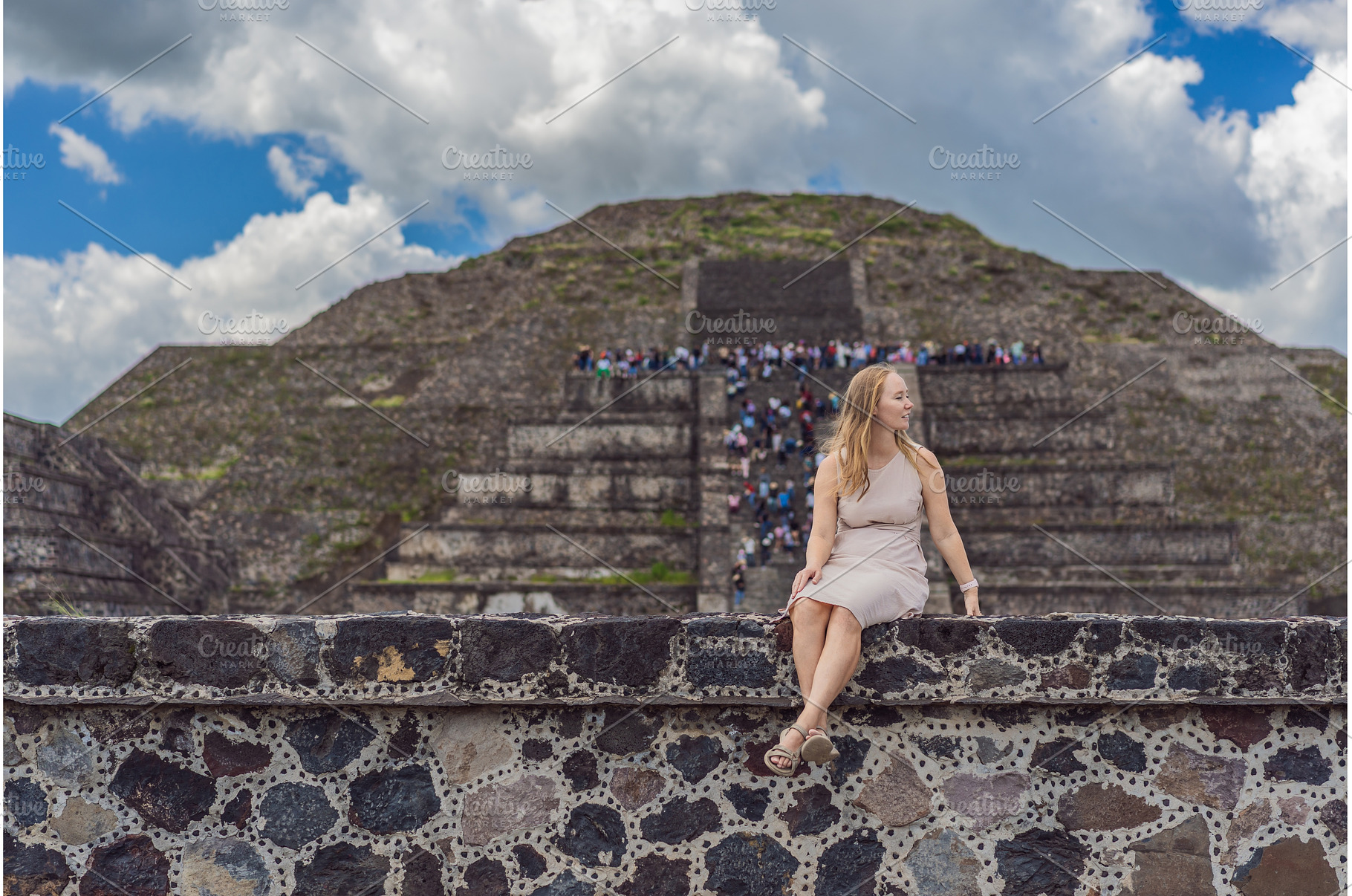 Female tourist standing in front of, an Architecture Photo by Elizaveta Galitskaya