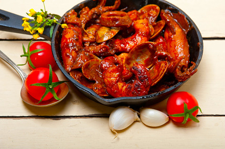 fresh seafoos stew on an iron skillet, a Food & Drink Photo by keko64