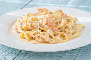 Creamy fettuccine shrimp pasta, a Food & Drink Photo by Alexander Prokopenko