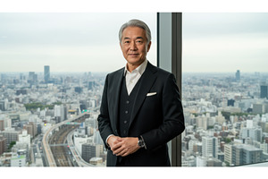 Confident businessman standing in, an Architecture Photo by Igor Tichonow