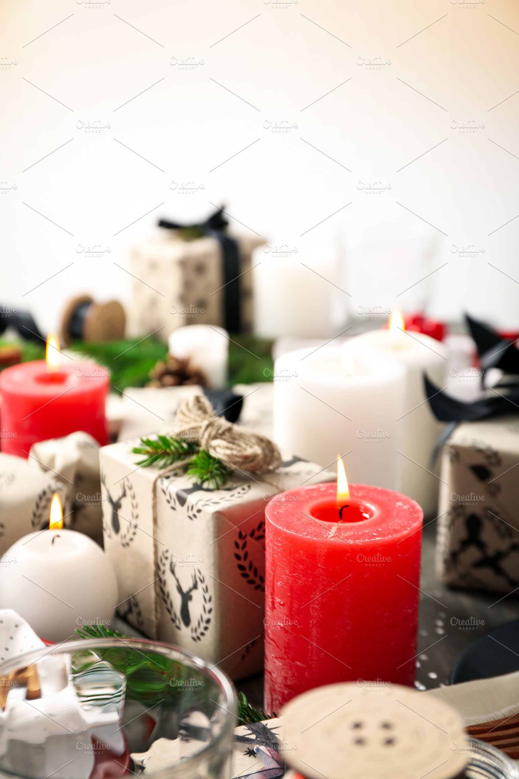 Concept of Happy New Year, gift boxes and candles, blurred backg, an Arts & Entertainment Photo by AtlasStudio PRO