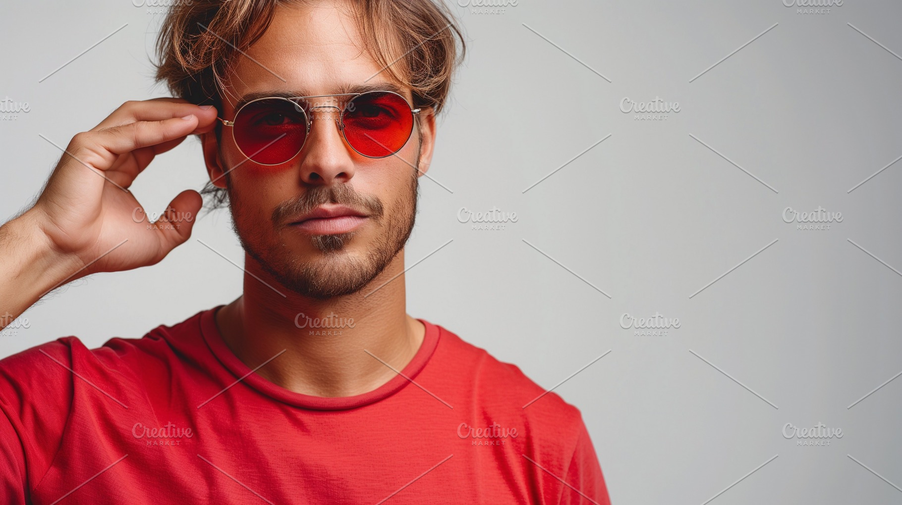 Stylish young man in red shirt and round sunglasses, exuding confidence and coo, a Person Photo by ImageMir