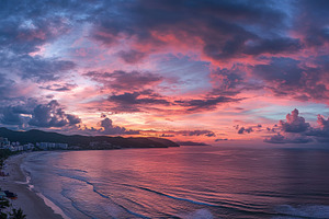 Vibrant sunset sky over Patong beach, a Photo by Iftikhar Alam