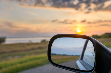 Rear view mirror reflection car sun, a Transportation Photo by hitdelight