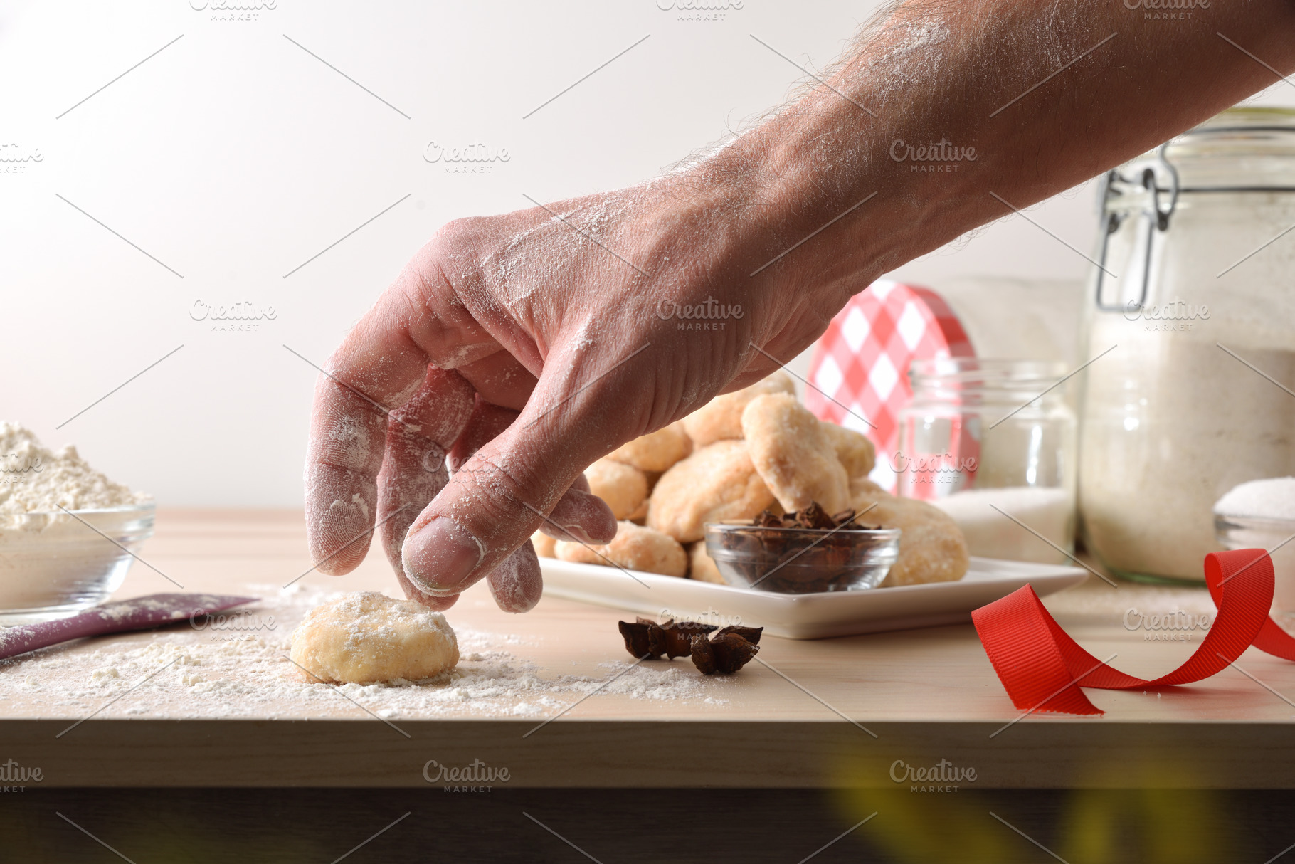 Person making anise cookies with ingredients around isolated bac, a Food & Drink Photo by Davizro's Market