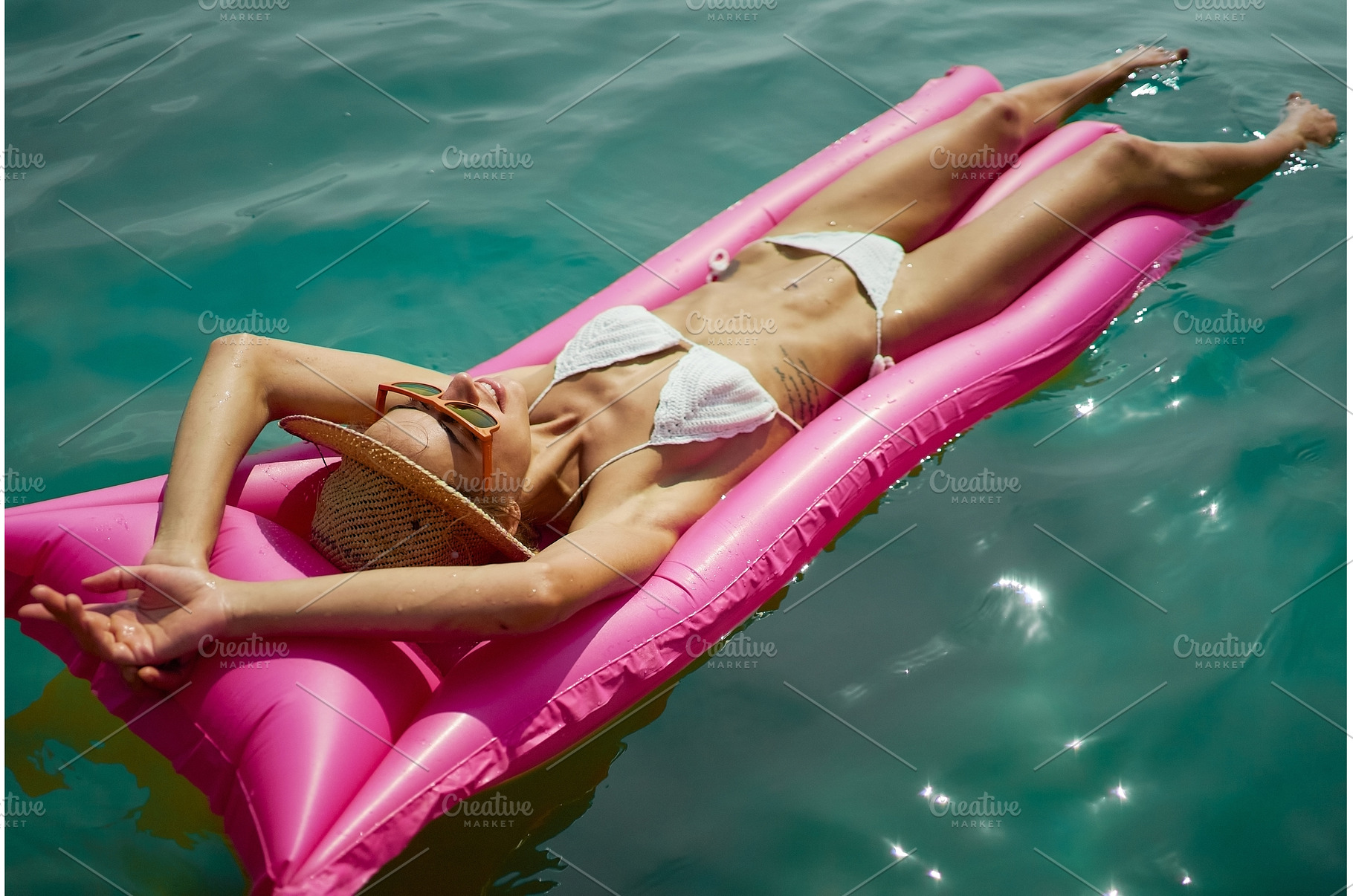 Summer Bikini woman on inflatable, a Person Photo by vitaliymateha photography