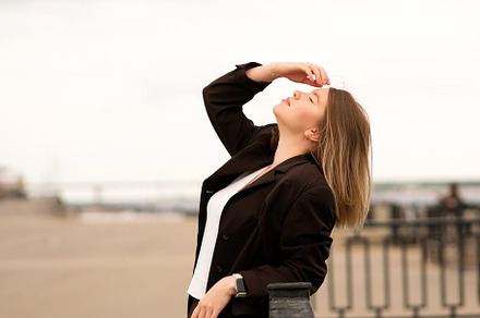 Woman in brown suit