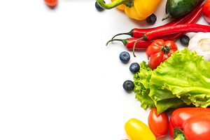 Fresh vegetables and fruits creating healthy eating border, a Food & Drink Photo by Olena Rudo