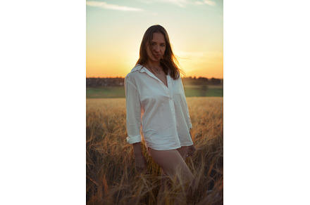 Woman in White Shirt at Sunset in, a Person Photo by Jan Jack Russo Media