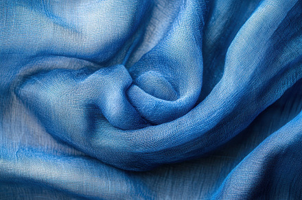 Close up view of delicate blue cloth, a Photo by Iftikhar Alam