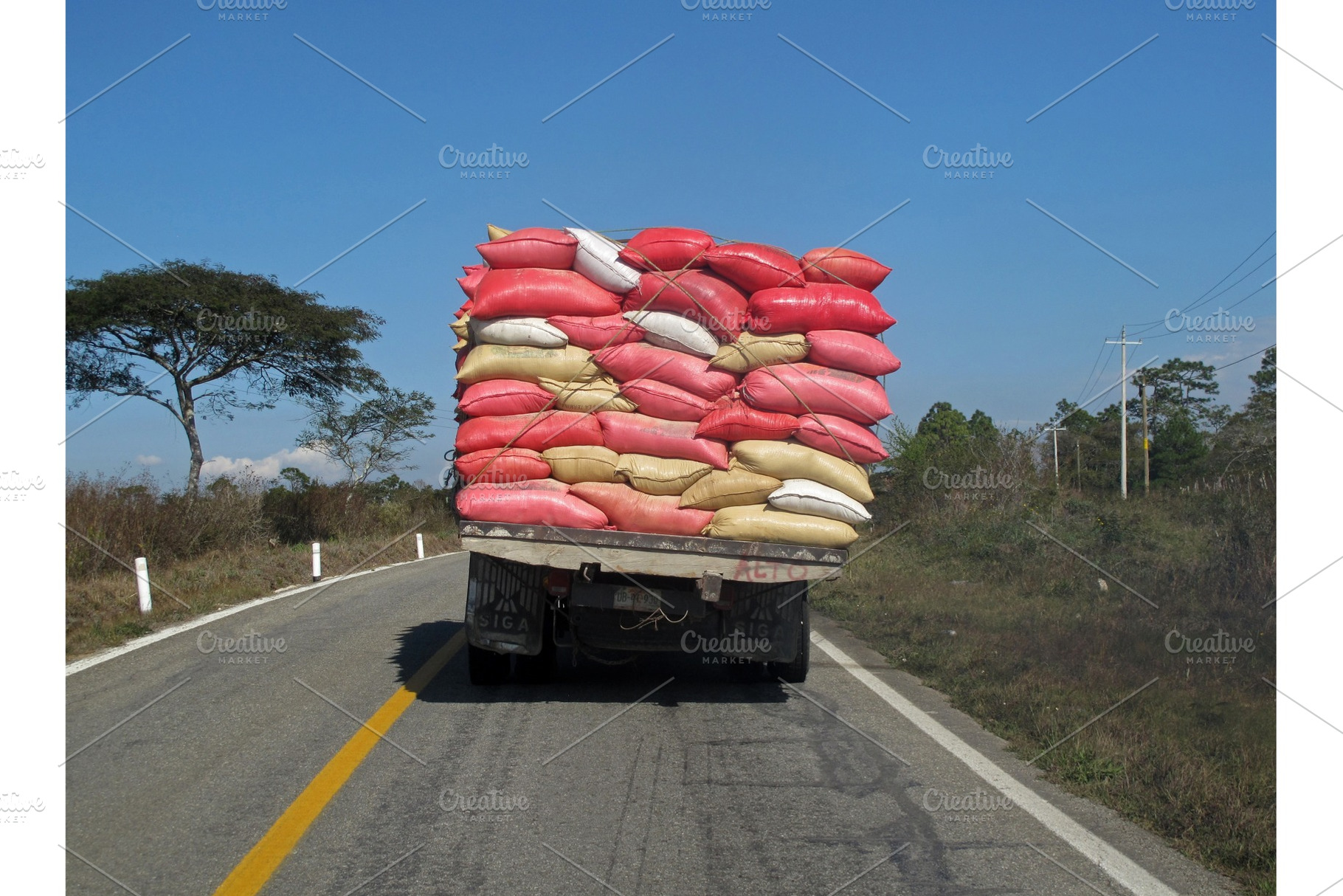 Overloaded truck, Mexico, a Transportation Photo by reisegraf.ch