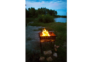 evening landscape - burning firewood, a Background Photo by Artsaba Family