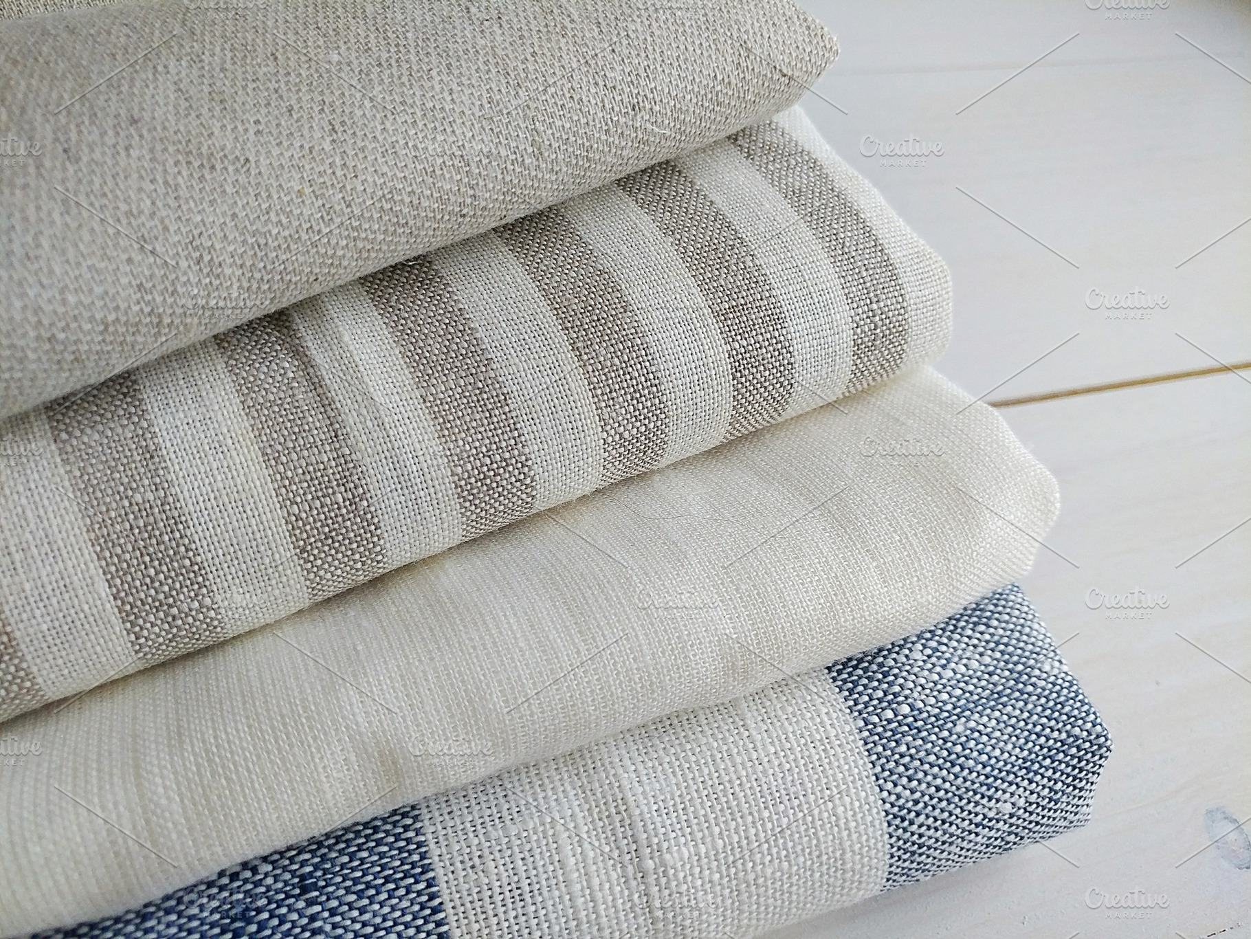 Pile of fabrics containing color, detail, and closeup, a Beauty & Fashion Photo by OksanaAn