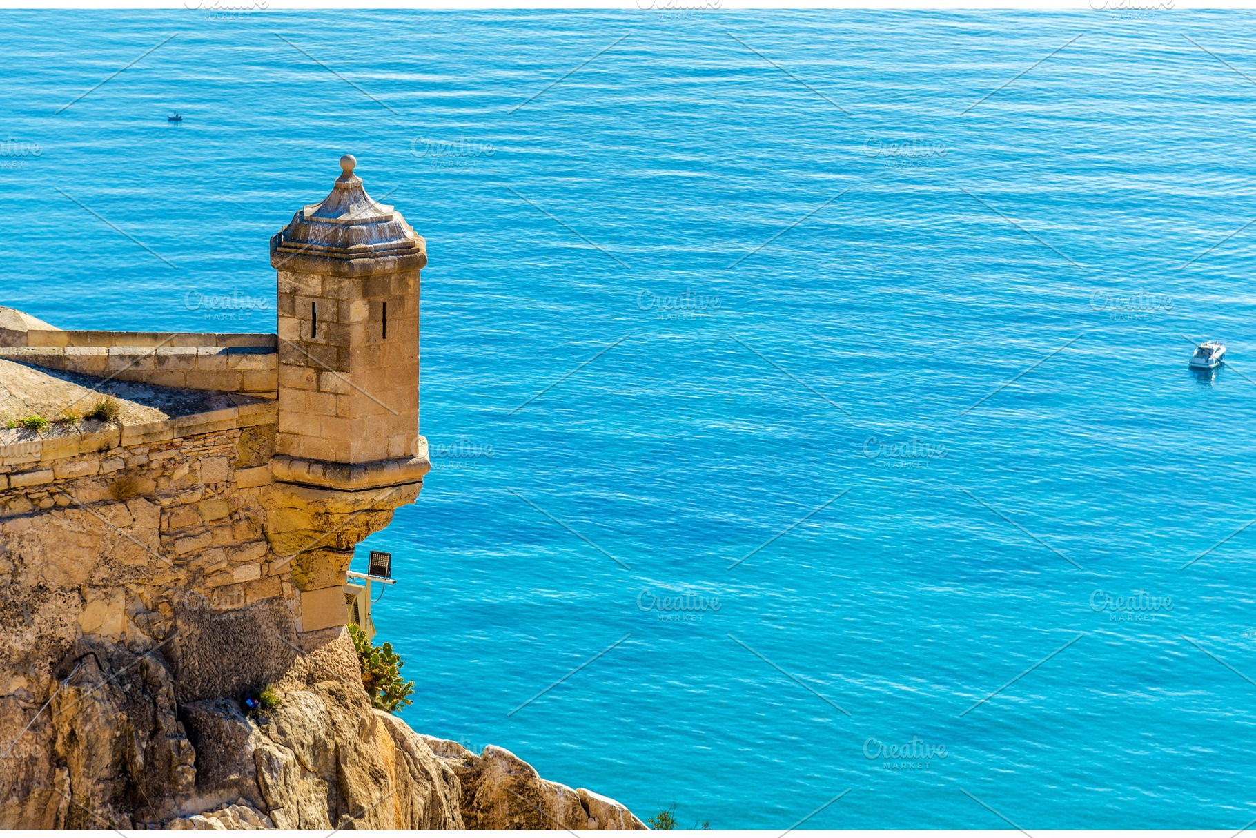 Watchtower of santa barbara castle in alicante spain featuring castle, tower, an Architecture Photo by Leonid Andronov