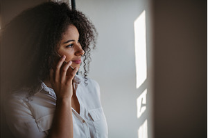 Portrait of young woman using, a Person Photo by HalfPoint