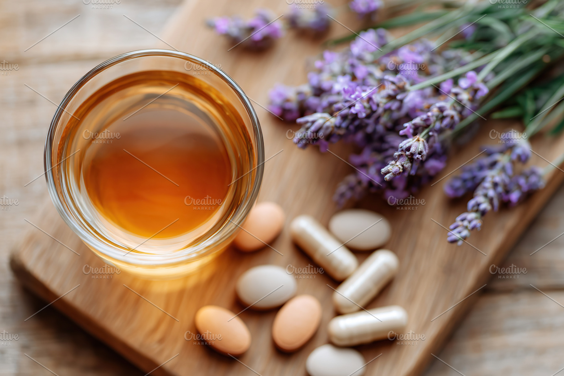 Herbal tea made with fresh lavender and supplements on a wooden surface, a Food & Drink Photo by AlyaAnd