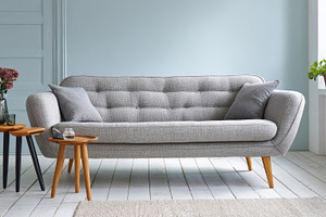 Modern couch in a home setting, a Photo by Beautiful things