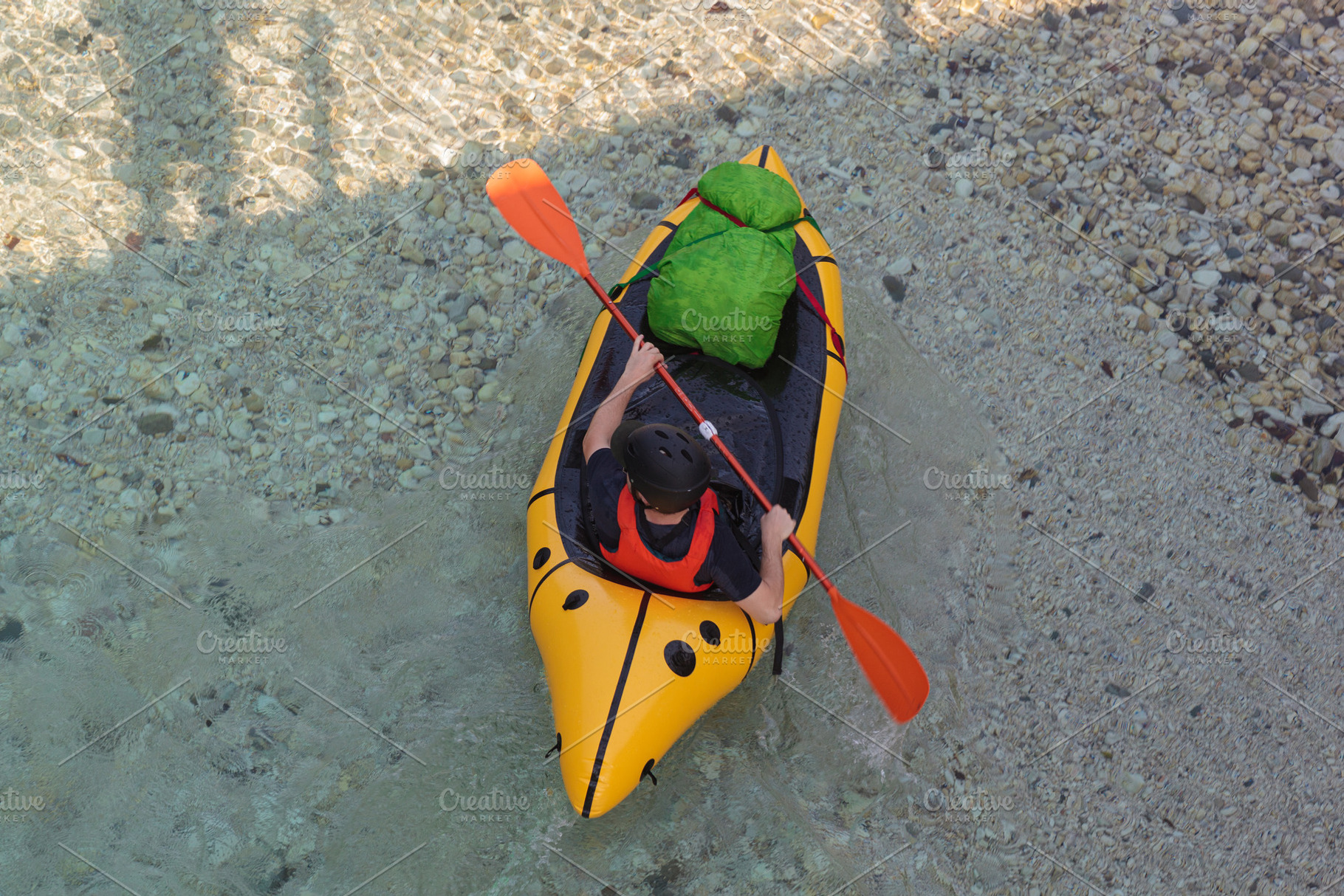 Kayaking Down the River. Caucasian Men in yellow Kayak. Soca river, Bovec, Slov, a Sports & Recreation Photo by Bepslabor