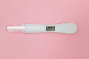 Positive pregnancy test stock photo