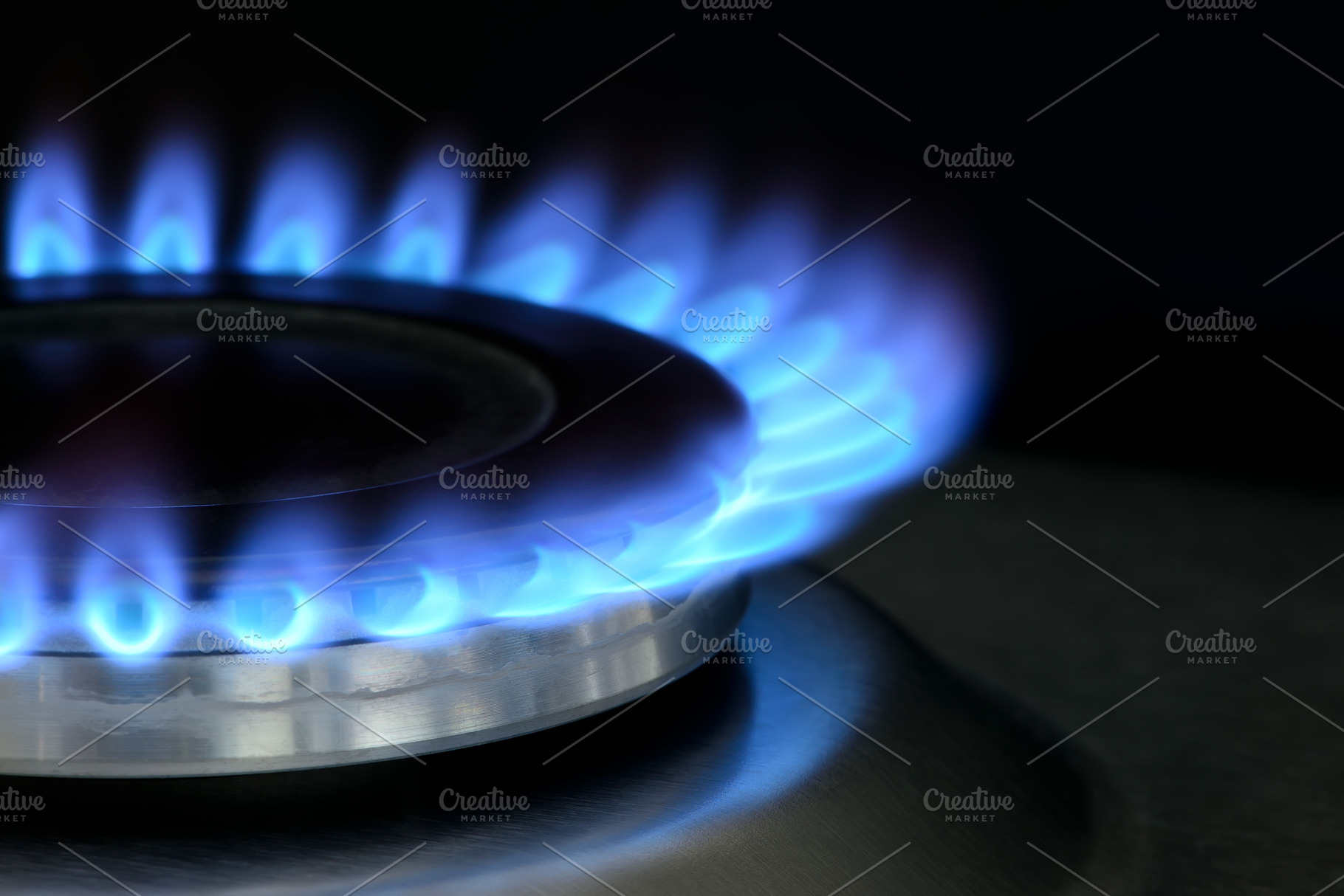 Natural gas burning on gas stove featuring natural gas, flame, and fire, an Industrial Photo by FedotovAnatoly