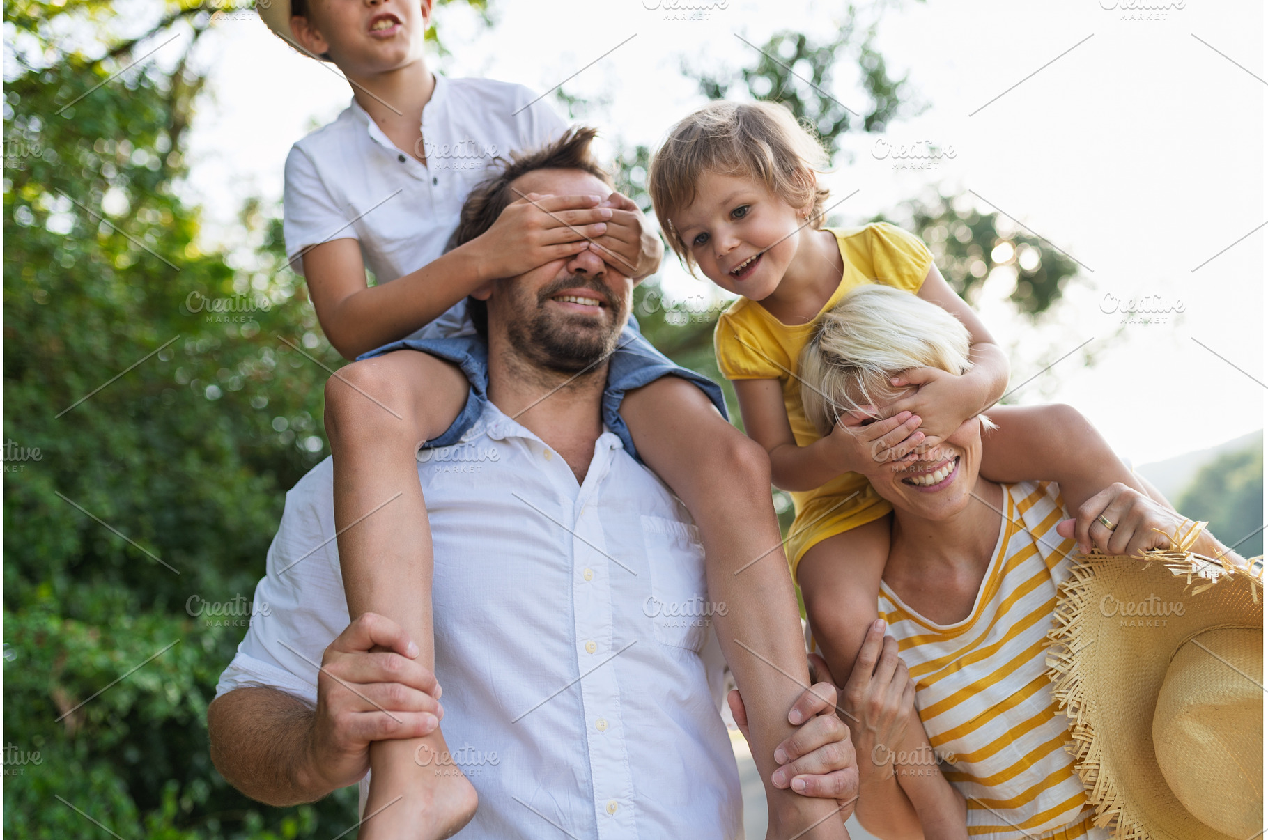 Family with small children in sunny, a Person Photo by HalfPoint