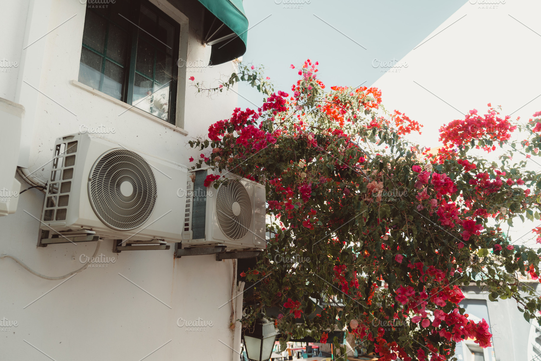 Air Conditioners and Bougainvillea, an Industrial Photo by SkyNext