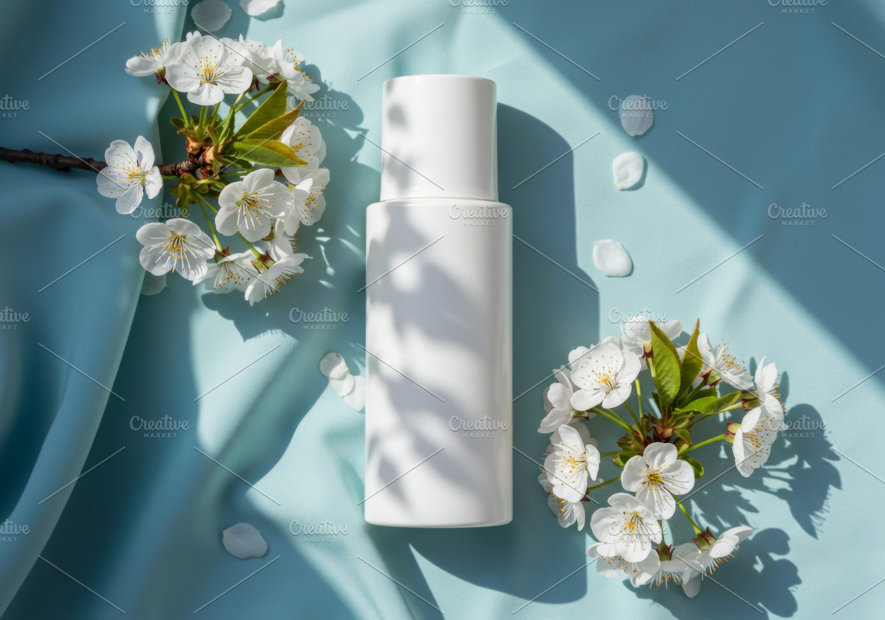 White cosmetic bottle with cherry bl, a Beauty & Fashion Photo by professorinc